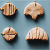 clay tokens used to represent trade goods in the Near East prior to the invention of phonetic writing